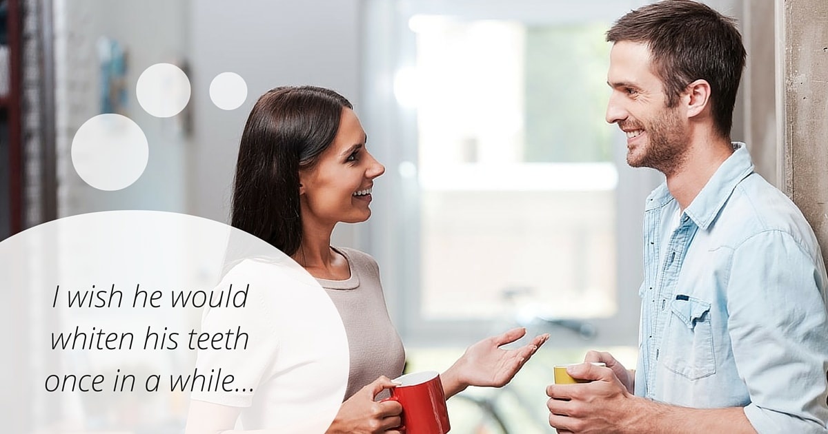 woman telling man to whiten his teeth
